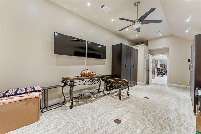 interior space featuring light colored carpet and vaulted ceiling