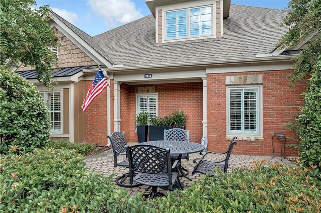 back of house featuring a patio