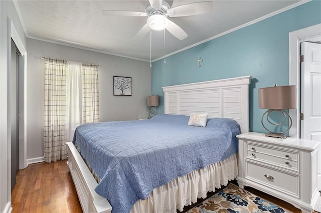 141 Parr Wade Rd SE, Cartersville, GA 30120 - bedroom with wood finished floors, ornamental molding, and a ceiling fan