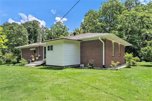 141 Parr Wade Rd SE, Cartersville, GA 30120 - view of home's exterior with a yard and brick siding