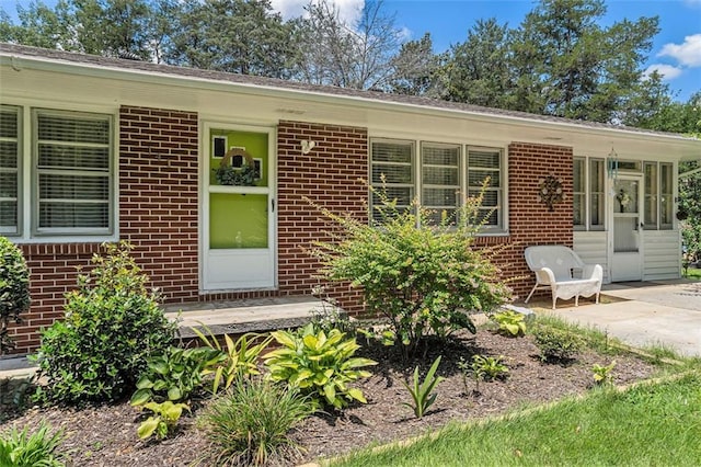 141 Parr Wade Rd SE, Cartersville, GA 30120 - view of front facade with brick siding and a patio