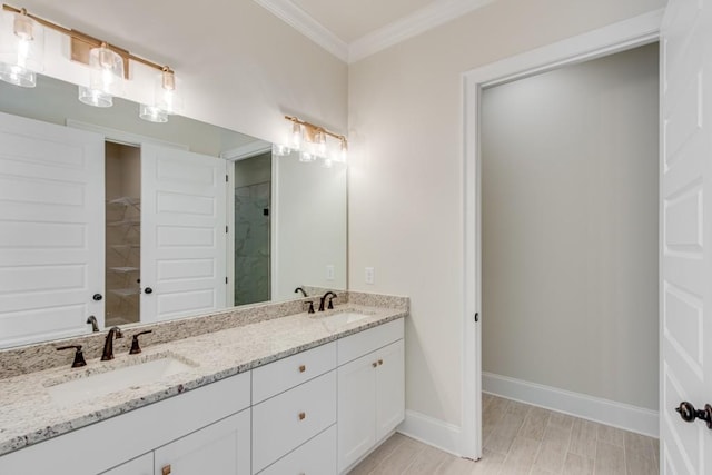 bathroom with vanity, walk in shower, and ornamental molding