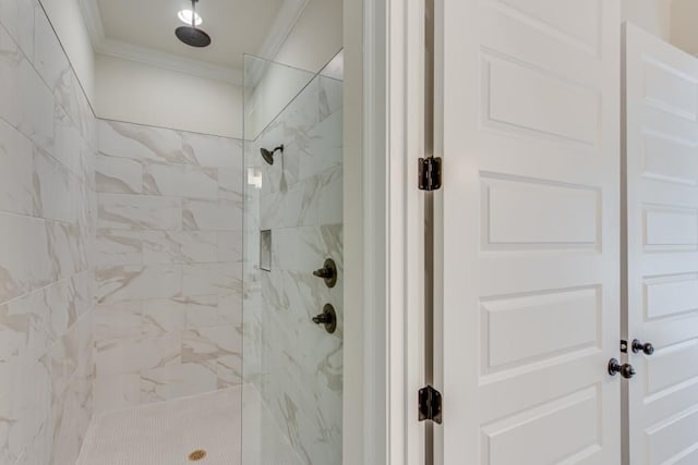 929 Hilltop Park Ct, Dacula, GA 30019 - bathroom featuring ornamental molding and a marble finish shower