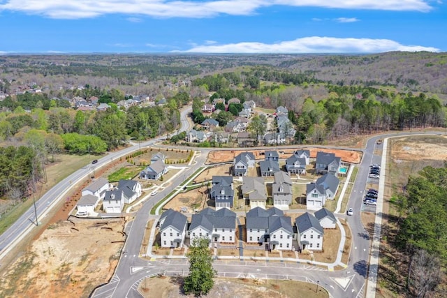 929 Hilltop Park Ct, Dacula, GA 30019 - aerial view of property and surrounding area featuring a heavily wooded area and nearby suburban area