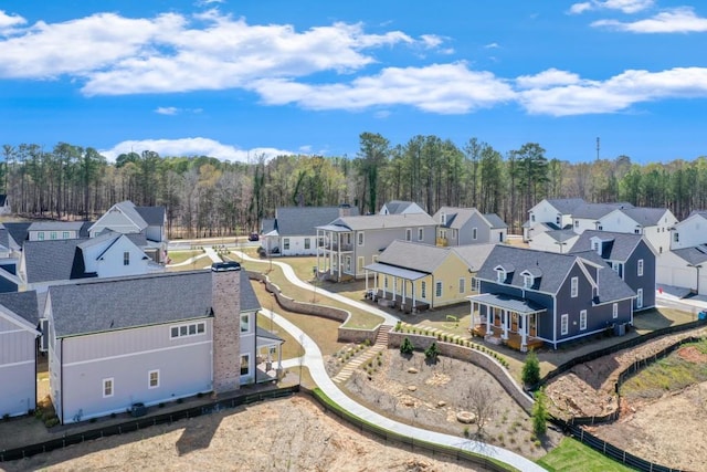 929 Hilltop Park Ct, Dacula, GA 30019 - aerial perspective of suburban area with a heavily wooded area