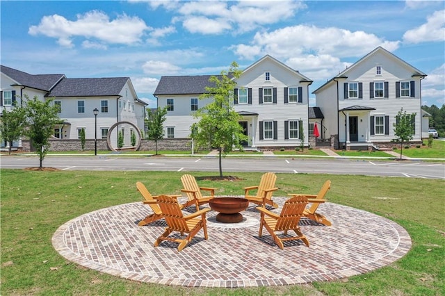 929 Hilltop Park Ct, Dacula, GA 30019 - view of patio featuring a fire pit