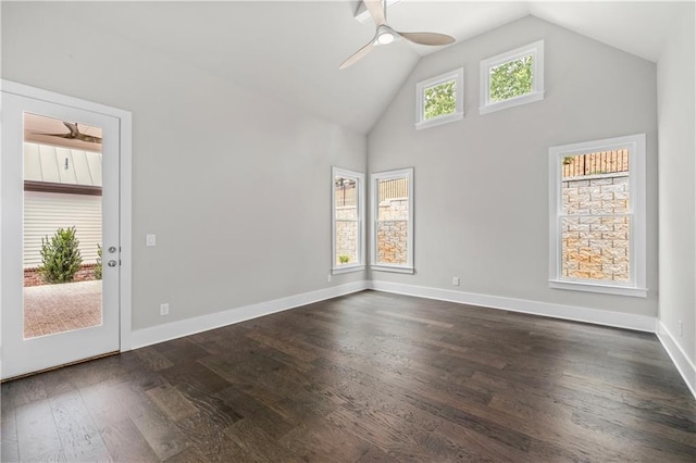 spare room with high vaulted ceiling, baseboards, ceiling fan, and dark wood-style flooring