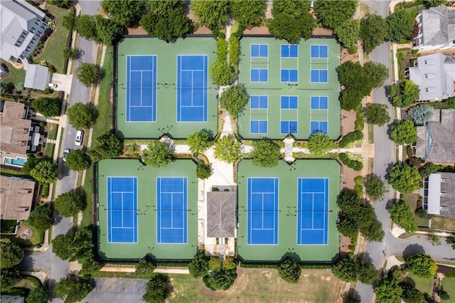 birds eye view of property with a residential view