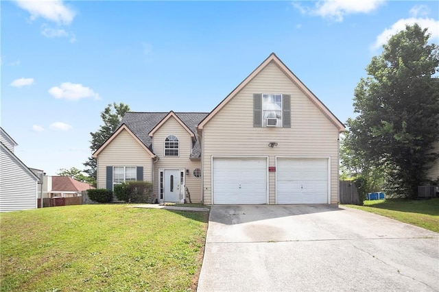 traditional-style home with a front lawn, a garage, concrete driveway, cooling unit, and central air condition unit