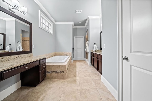 bathroom with vanity, a relaxing tiled tub, tile patterned floors, and crown molding