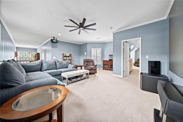 carpeted living room with ornamental molding and ceiling fan