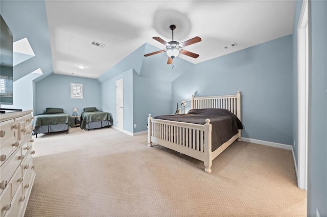 bedroom featuring ceiling fan, lofted ceiling, and light colored carpet