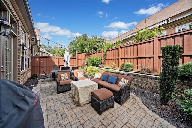 view of patio / terrace featuring grilling area and an outdoor hangout area