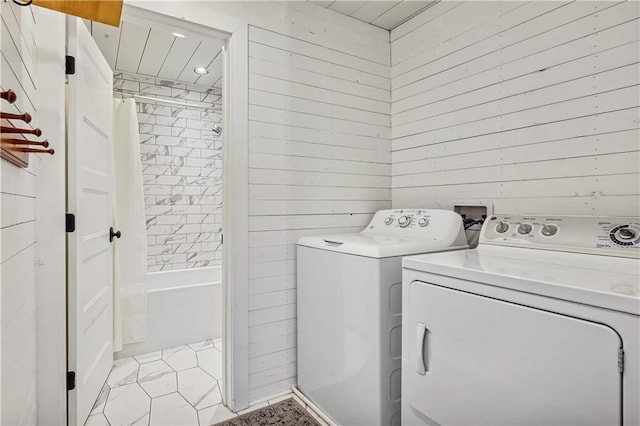2121 Jep Wheeler Rd, Woodstock, GA 30188 - laundry room featuring washer and dryer and wood walls