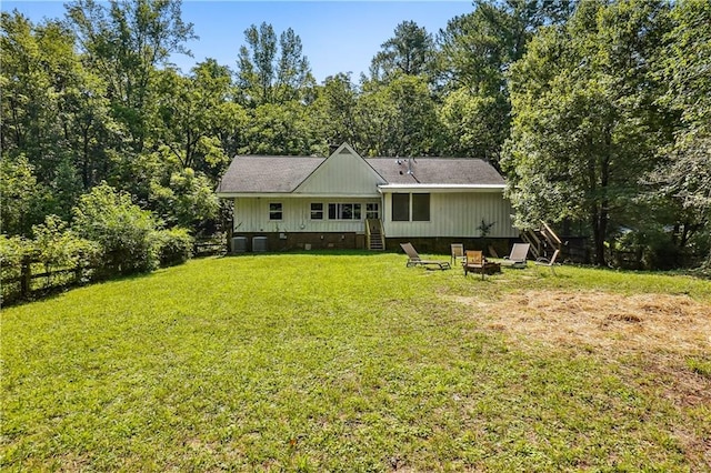 2121 Jep Wheeler Rd, Woodstock, GA 30188 - rear view of property featuring a fire pit and crawl space