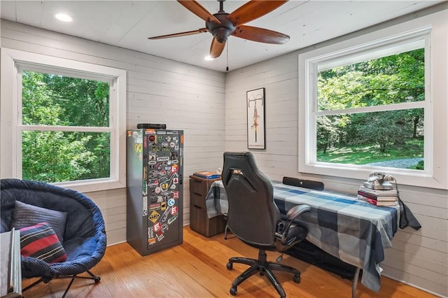 2121 Jep Wheeler Rd, Woodstock, GA 30188 - office space featuring plenty of natural light, wood finished floors, a ceiling fan, and wooden walls