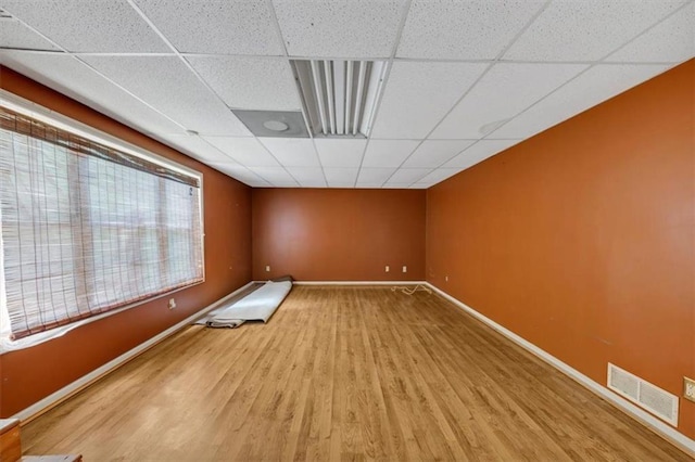 1735 Silver Way, Lithia Springs, GA 30122 - empty room featuring a paneled ceiling and wood finished floors