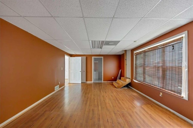 1735 Silver Way, Lithia Springs, GA 30122 - spare room with a paneled ceiling and wood finished floors