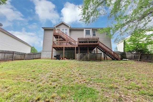 1735 Silver Way, Lithia Springs, GA 30122 - back of property with stairs, a fenced backyard, and a wooden deck