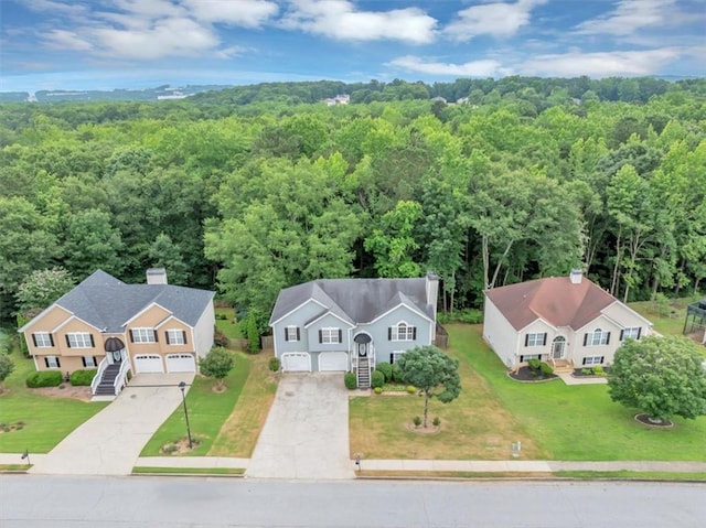 1735 Silver Way, Lithia Springs, GA 30122 - aerial view of property and surrounding area featuring a heavily wooded area