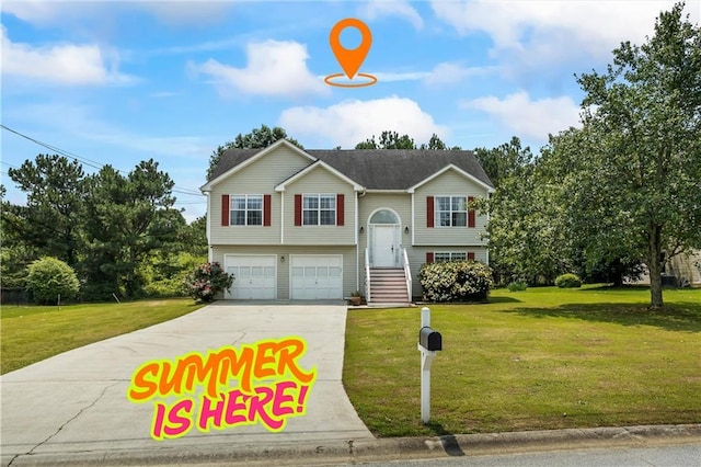 185 Fox Run, Loganville, GA 30052 - raised ranch with driveway, a front yard, and a garage