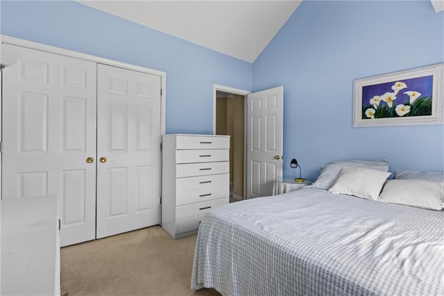185 Fox Run, Loganville, GA 30052 - bedroom with carpet floors, lofted ceiling, and a closet