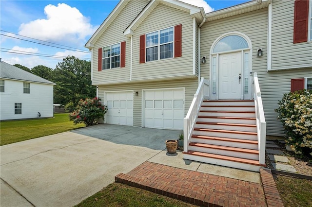 185 Fox Run, Loganville, GA 30052 - view of front of home featuring a garage, driveway, and a front yard