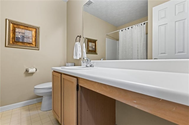 185 Fox Run, Loganville, GA 30052 - full bath featuring vanity, a textured ceiling, a shower with curtain, and tile patterned floors