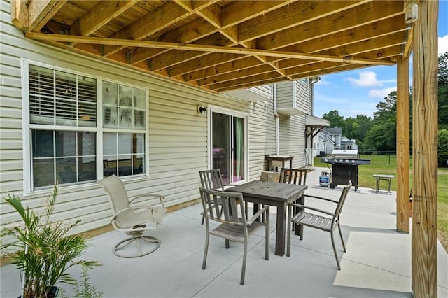 185 Fox Run, Loganville, GA 30052 - view of patio featuring outdoor dining area and a grill