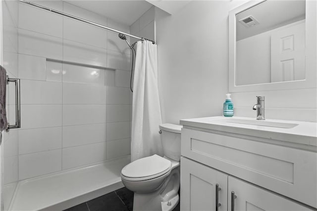 185 Fox Run, Loganville, GA 30052 - full bath with vanity, tiled shower, and tile patterned floors