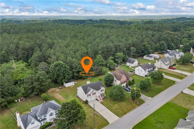 185 Fox Run, Loganville, GA 30052 - aerial perspective of suburban area featuring a forest