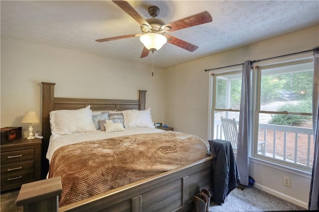 1638 River Trce, Auburn, GA 30011 - bedroom with carpet, multiple windows, baseboards, and ceiling fan