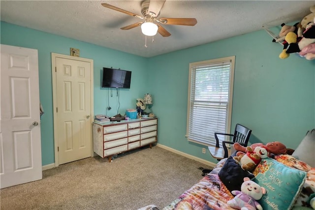 1638 River Trce, Auburn, GA 30011 - bedroom with carpet, baseboards, ceiling fan, and a textured ceiling
