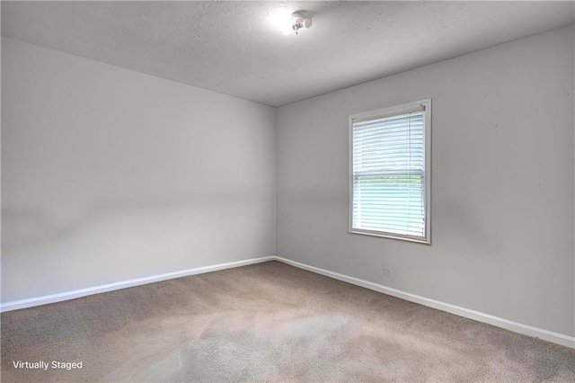 1638 River Trce, Auburn, GA 30011 - spare room featuring baseboards and carpet floors