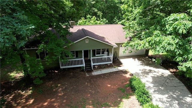 1638 River Trce, Auburn, GA 30011 - view of front of house with covered porch, driveway, and a chimney