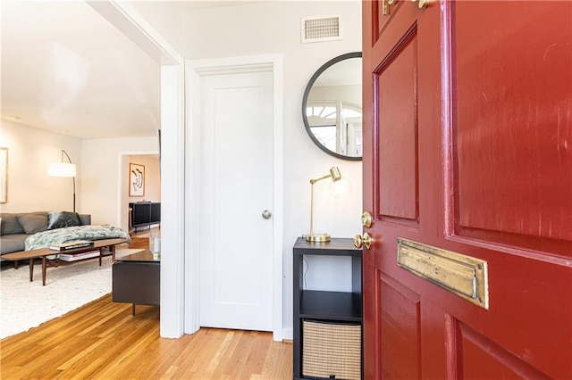 entrance foyer with light hardwood / wood-style flooring