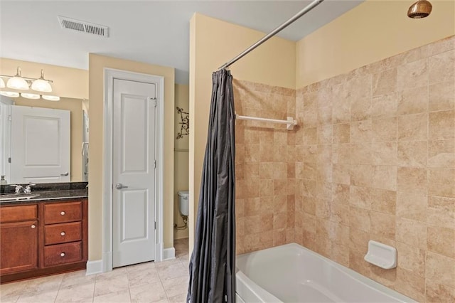 full bathroom featuring tile patterned flooring, vanity, shower / bath combination with curtain, and toilet