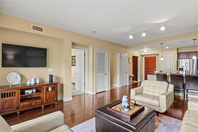 living room with hardwood / wood-style floors