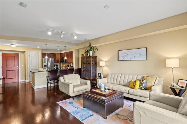 living room with dark hardwood / wood-style floors