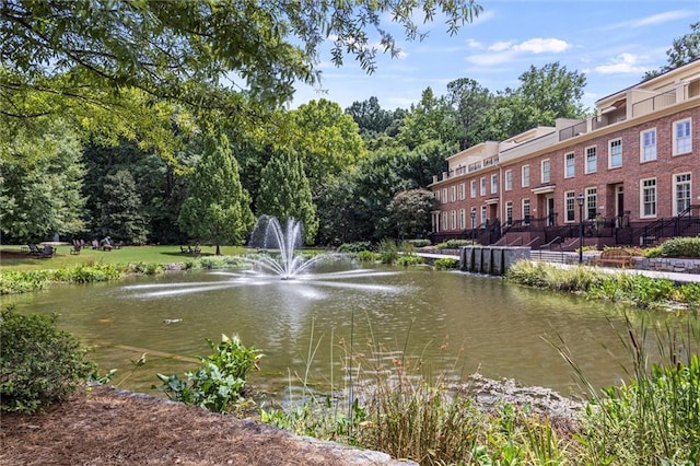 view of property's community featuring a water view