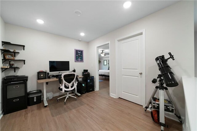 office featuring ceiling fan and light wood-type flooring