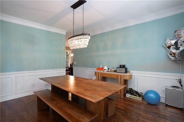 7185 Hartsfield Pl, Suwanee, GA 30024 - dining room featuring radiator heating unit, ornamental molding, dark wood finished floors, a chandelier, and wainscoting