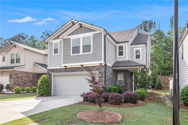 craftsman inspired home featuring stone siding, an attached garage, concrete driveway, board and batten siding, and a front lawn