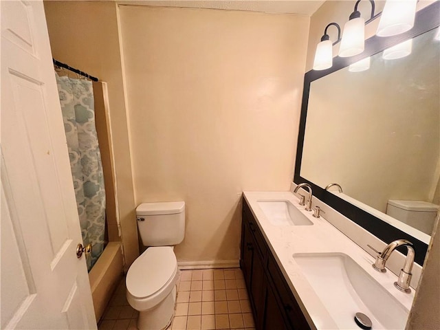 full bathroom featuring toilet, tile patterned flooring, shower / tub combo, and vanity