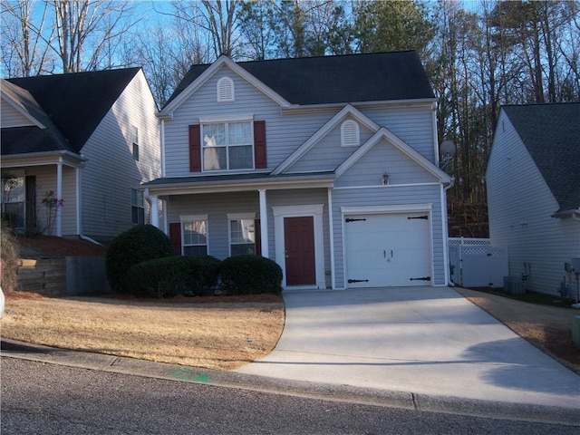 traditional-style home with driveway and cooling unit