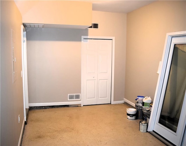 235 Woodland Way, Canton, GA 30114 - unfurnished bedroom featuring visible vents and baseboards