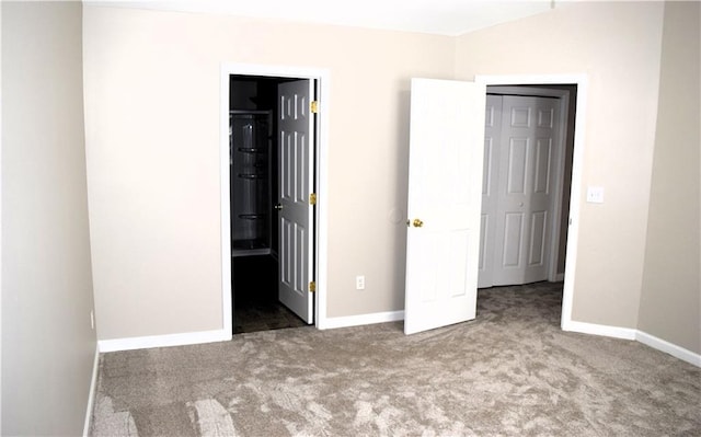 235 Woodland Way, Canton, GA 30114 - unfurnished bedroom with baseboards and carpet floors