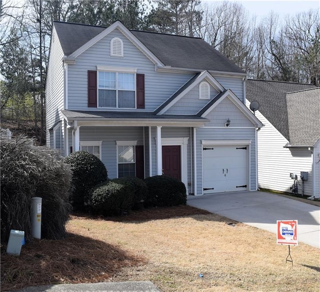 235 Woodland Way, Canton, GA 30114 - traditional-style home featuring a front lawn, concrete driveway, and a garage
