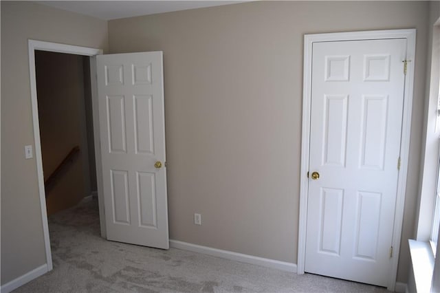 235 Woodland Way, Canton, GA 30114 - unfurnished bedroom with baseboards and carpet floors