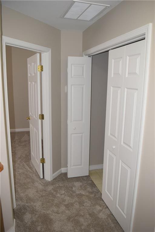235 Woodland Way, Canton, GA 30114 - unfurnished bedroom featuring a closet, baseboards, and carpet